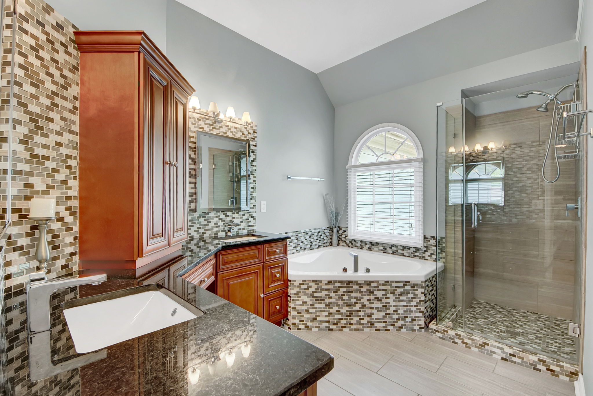 Primary bathroom vanity and tub