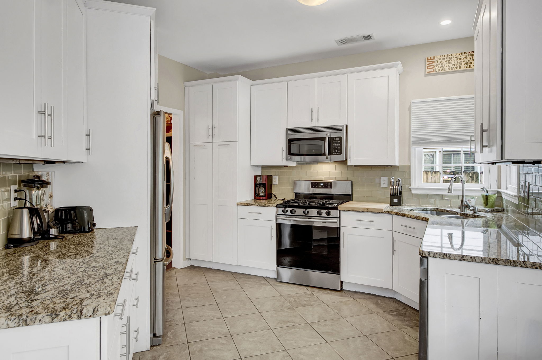 Updated kitchen with ample cabinetry